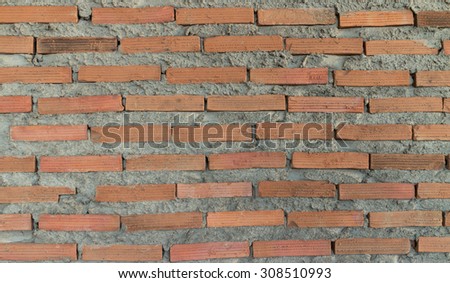 Orange brick wall surface background (background , texture)
