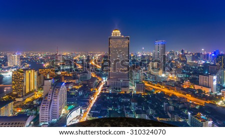 BANGKOK, THAILAND - APRIL 5, 2015: Landscape of Bangkok city in night time with bird view. This place is very popular that tourists like to take photos on top view of Bangkok.