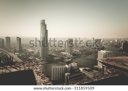 BANGKOK, THAILAND - APRIL 5, 2015: Landscape of Bangkok city in afternoon with bird view. This place is very popular that tourists like to take photos on top view of Bangkok.