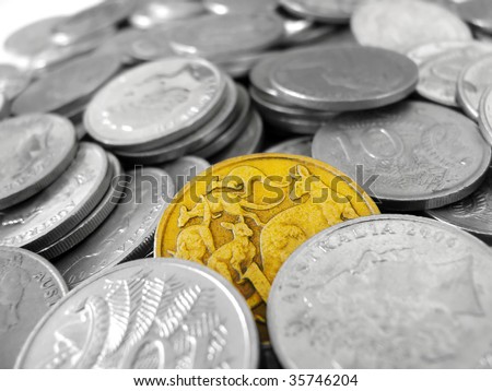 One gold coin among silver coins