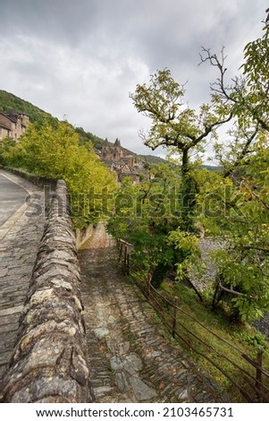  Conques is a former commune in the Aveyron department in Southern France, in the Occitanie region on September 25, 2020, the village is one of the prettiest villages of France Photo stock © 