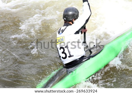 LA SEU D\'URGELL, CATALONIA - MARCH 22: Unidentified sports people struggling with the flow. ICF Canoe Slalom training 22 March 2015 in La Seu d\'Urgell, Catalonia. Parc Olimpic del Segre