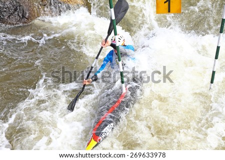 LA SEU D\'URGELL, CATALONIA - MARCH 22: Unidentified sports people struggling with the flow. ICF Canoe Slalom training 22 March 2015 in La Seu d\'Urgell, Catalonia. Parc Olimpic del Segre