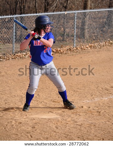 Teen Girl Softball Player Batting, vertical