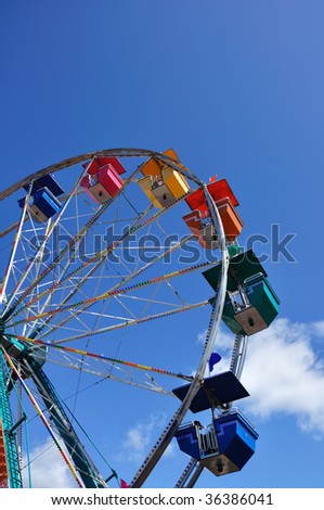 Ferris Wheel Against a Blue Sky, Copy Space, Vertical