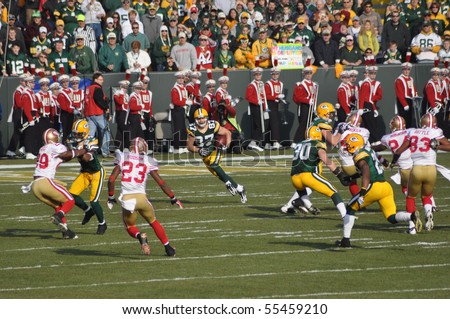 GREEN BAY, WI - NOVEMBER 22 : Green Bay Packers receiver Jordy Nelson returns a kick-off in a game at Lambeau Field against the San Francisco 49ers on November 22, 2009 in Green Bay, WI