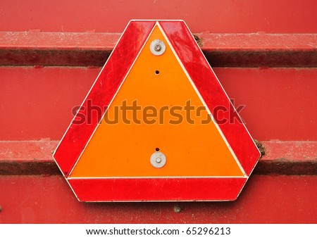 Orange and Red Reflective Slow Moving Vehicle Sign