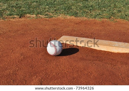 Baseball on the Pitcher\'s Mound Near the Pitching Rubber