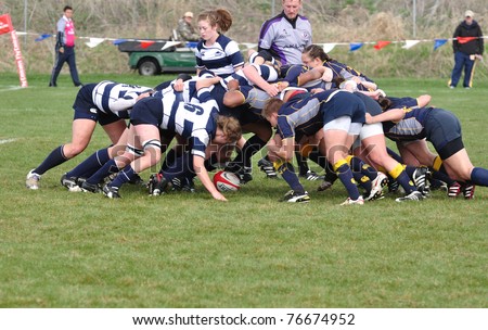 BLAINE, MN - APRIL 30: A scrum in a women's collegiate rugby match between Navy and the BYU Cougars in the NCAA Division I College Championship quarterfinals on April 30, 2011 in Blaine, MN