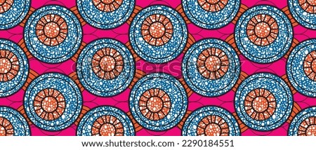 African ethnic traditional pattern. seamless beautiful Kitenge, chitenge, Ankara style. fashion design in colorful. Geometric blue circle abstract motif. pink background. African wax prints