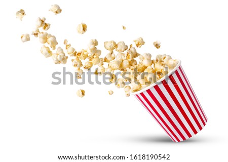 Popcorn viewed float Paper cup with popcorn on white isolated 