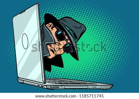 spy. laptop computer. surveillance and hacking. Comic cartoon pop art retro vector illustration