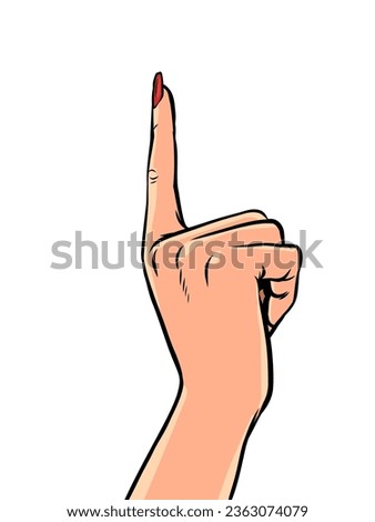 Index finger of a girl with a manicure. Woman finger pointing up.