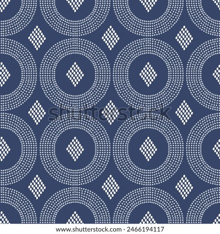 Seamless abstract dotted circle and diamond pattern. Ethnic vector geo repeat in indigo shade great for stationery, homeware, wallpaper, rug, apparel, gifts, prints, backgrounds, textiles.