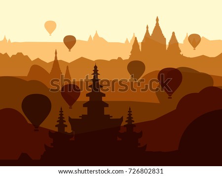 Hot air balloons fly over the ancient pagodas of Bagan.