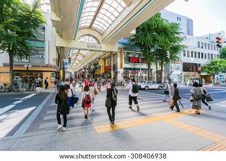 SAPPORO, JAPAN - JUNE 30, 2014 :  Tanukikoji shopping street  is a landmark of Sapporo, Hokkaido, Japan.