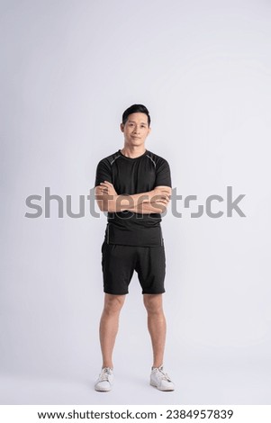 Similar – Image, Stock Photo Asian man standing on street