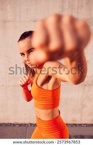 Similar – Image, Stock Photo Female boxer punching camera