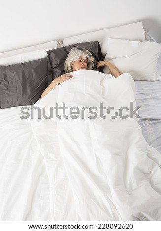 Sleeping woman from high angle view