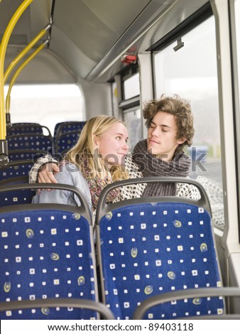 Young couple alone on the bus
