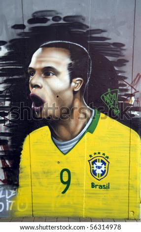 JOHANNESBURG - JUNE 20: A Graffiti painting on a public wall in the city centre of Brazil\'s Luis Fabiano, created in the spirit of the 2010 Soccer World Cup in Johannesburg, South Africa on June 20, 2010