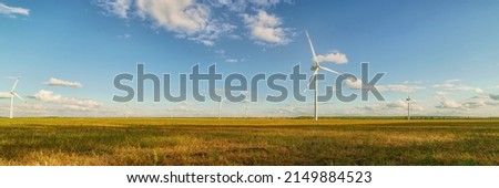 Similar – Foto Bild Landschaft mit Windkraft