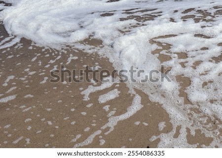 Similar – Image, Stock Photo wet sandy shore on sunny day in beach