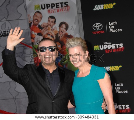 LOS ANGELES - MAR 11:  Ricky Gervais and Jane Fallon arrives at the MUPPETS MOST WANTED LOS ANGELES PREMIERE  on March 11, 2014 in Los Angeles, CA