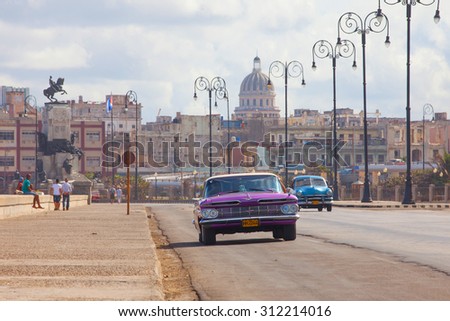 HAVANA, CUBA - FEBRUARY 2013: The old car overlooking the Capitol