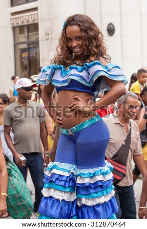 HAVANA, CUBA, FEBRUARY 15, 2013 : African woman posing in carnival costume
