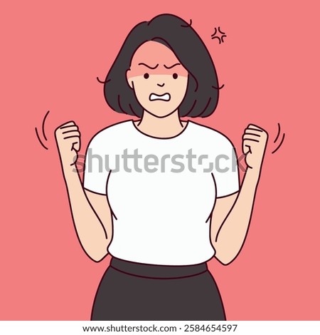 Angry Woman Clenching Fists. Furious woman in a white shirt clenches fists with a flushed face against a red background.