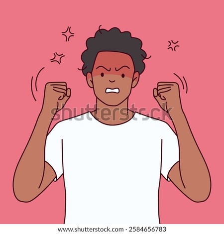 Angry Black Man in White Shirt. Furious Black man in a white shirt clenches fists with a flushed face against a pink background.