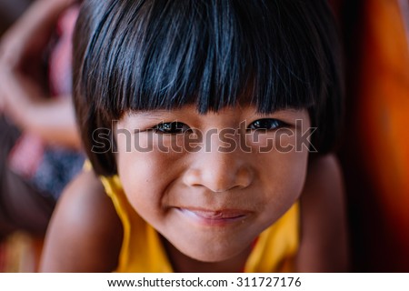 PHIMAI, THAILAND - MAY 5 : Unidentified young thai girl pose with smiling face on May 5, 2015 in Phimai, Thailand. Wedding ceremony in Phimai Thailand.