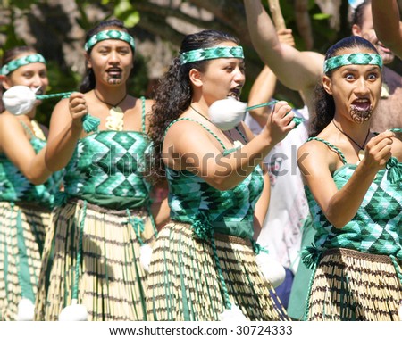 OAHU - CIRCA JUNE 2006 -Dancers dressed as warriors perform at the Polynesian Cultural Center circa June 2006 in Oahu. The Center will celebrate its 50th anniversary in 2013.