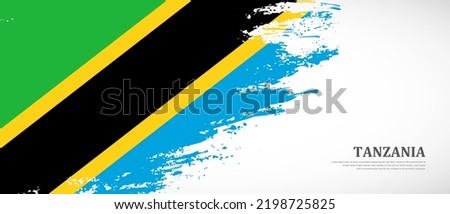 National flag of Tanzania with textured brush flag. Artistic hand drawn brush flag banner background