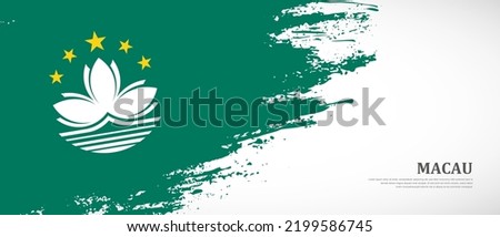 National flag of Macau with textured brush flag. Artistic hand drawn brush flag banner background