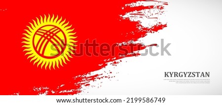 National flag of Kyrgyzstan with textured brush flag. Artistic hand drawn brush flag banner background