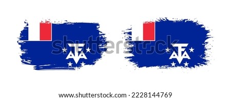 Set of two grunge brush flag of French Southern and Antarctic Lands on solid background