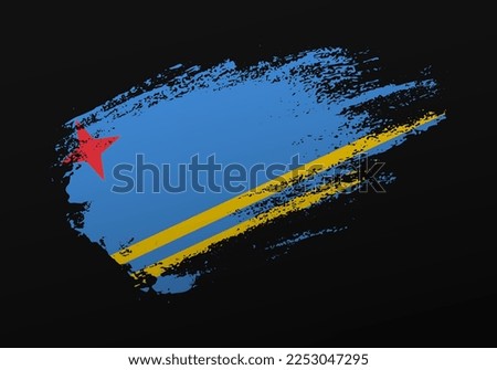 Abstract creative patriotic hand painted stain brush flag of Aruba on black background