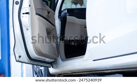 Similar – Image, Stock Photo Car stoped on the road with view of typical rural Icelandic Church with red roof in Vik region. Iceland