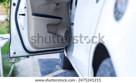 Similar – Image, Stock Photo Car stoped on the road with view of typical rural Icelandic Church with red roof in Vik region. Iceland