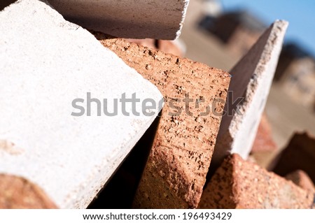 Broken bricks and concrete lying in a pile.