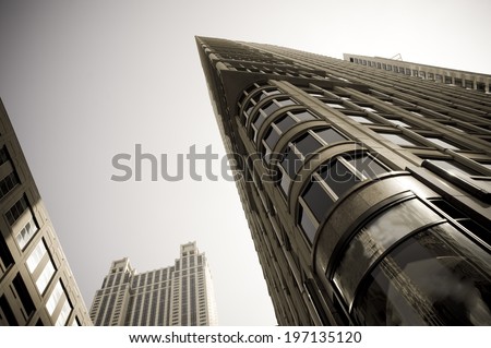 A skyward street level view of an impressive building.