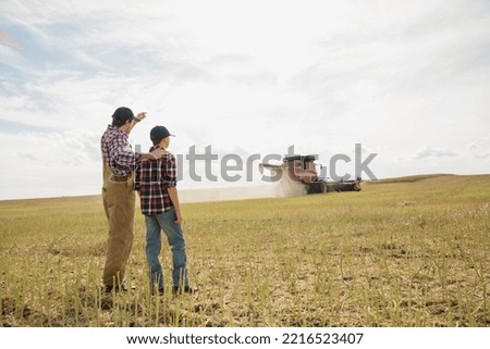 Similar – Image, Stock Photo Father explains nature to child