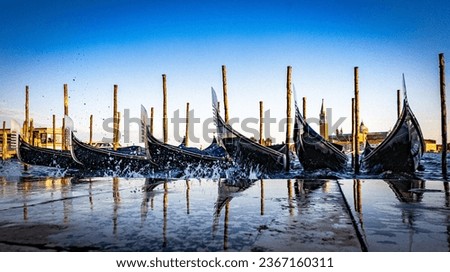 Similar – Image, Stock Photo The gondolas splash in the blue calm water. They are attached to wooden poles.