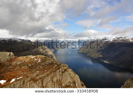 Preikestolen / Preikestolen or Prekestolen, also known by the English translations of Preacher\'s Pulpit or Pulpit Rock, is a famous tourist attraction in Forsand, Ryfylke, Norway.
