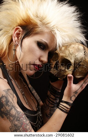 Young alternative woman with a skull.