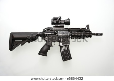 Heavily Used Military M16 Rifle With Short Barrel On A White Background ...