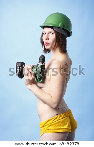 Sexy woman with a power drill.