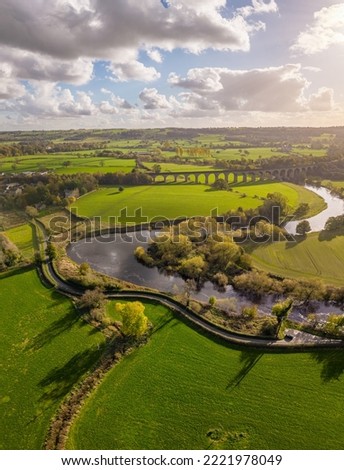 Aerial view over Arthington Viaduct and the River Wharfe on a sunny autumn day. Meandering river bends through the North Yorkshire countryside. UK Сток-фото © 